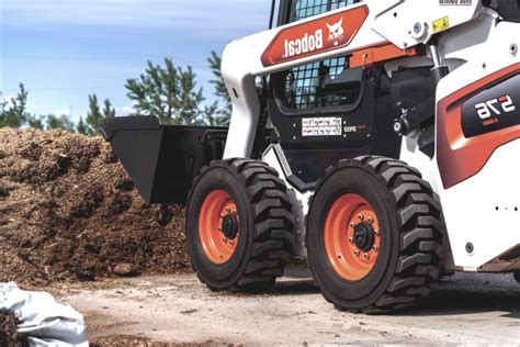 track vs wheel skid steer|convert skid steer to tracks.